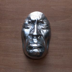 Silver effect Sadness wooden base 30x30cms