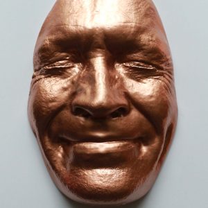 Copper effect Smile 19x12cms